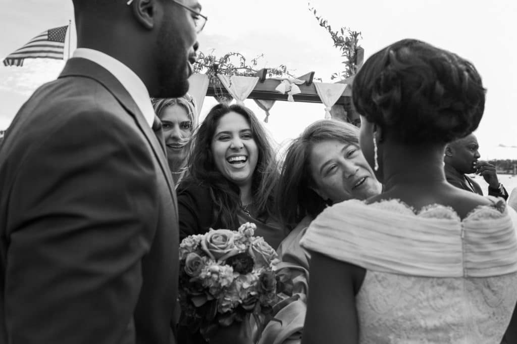 excited guests greet the newly married couple right after the ceremony, Bristol RI