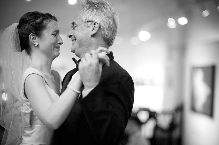 father and daughter dancing during her wedding