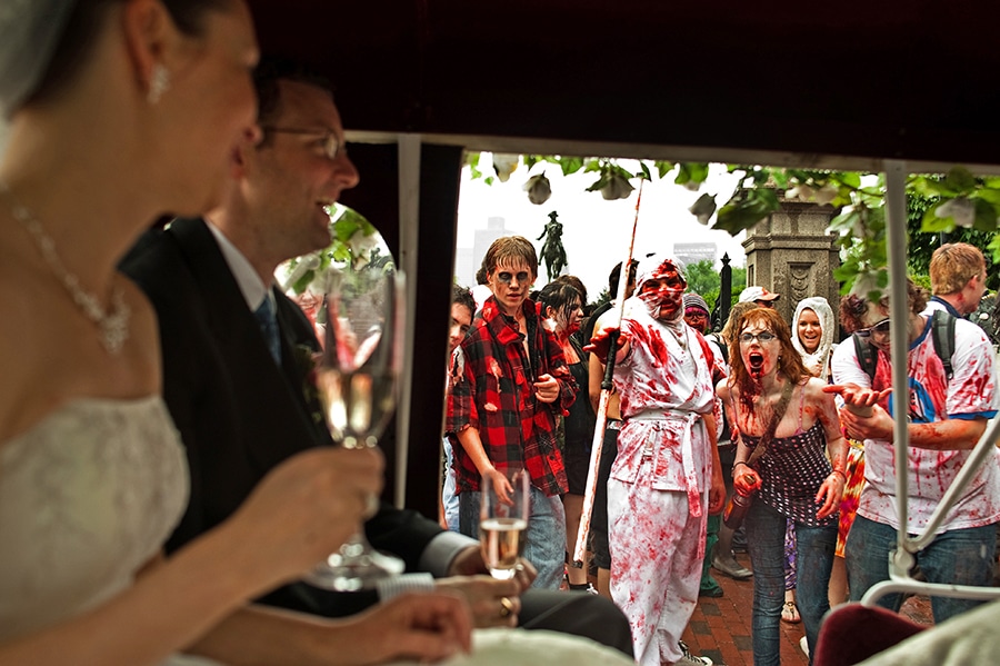 Boston MA wedding at the Public Gardens - the bride and groom got into their get away horse drawn carriage right after their ceremony, which coincided with a Zombie Walk