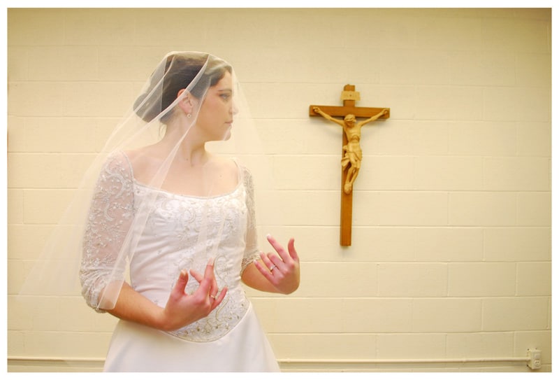 Lovely moment before th bride walks down the aisle at her hometown church in Beaumont Texas