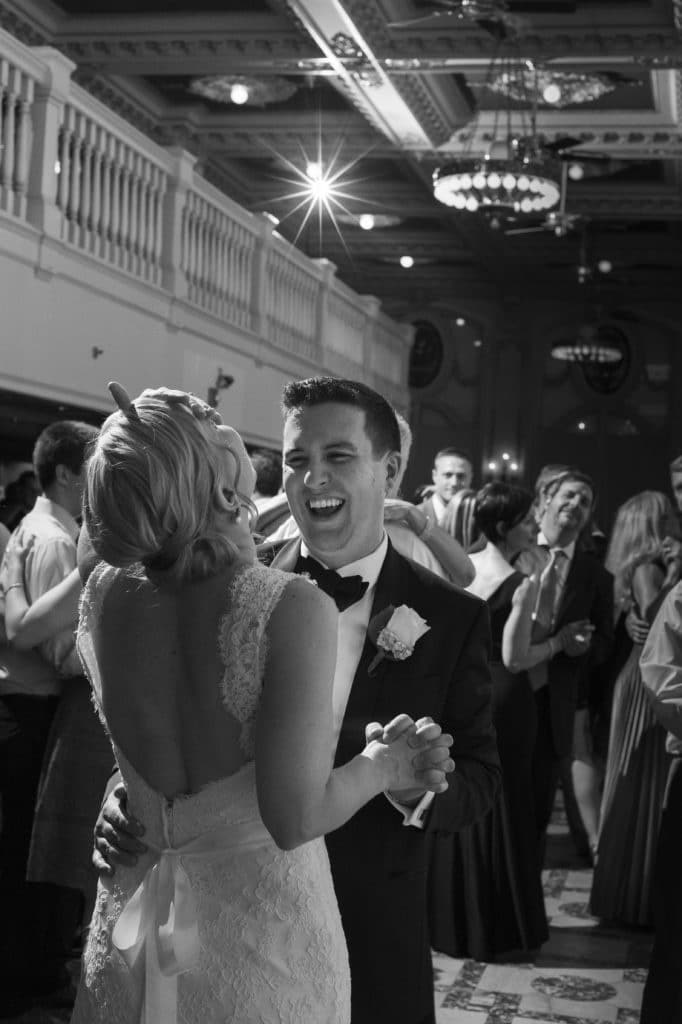 fun moment of a groom and bride laughing while dancing during their receptions at the Dorrance in Providence RI
