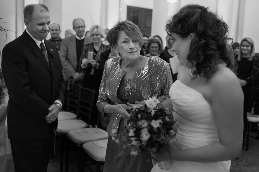 mom walks her daughter down the aisle at her wedding in the Providence Public Library PVD RI